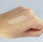 2. Spread gently following the skin texture.